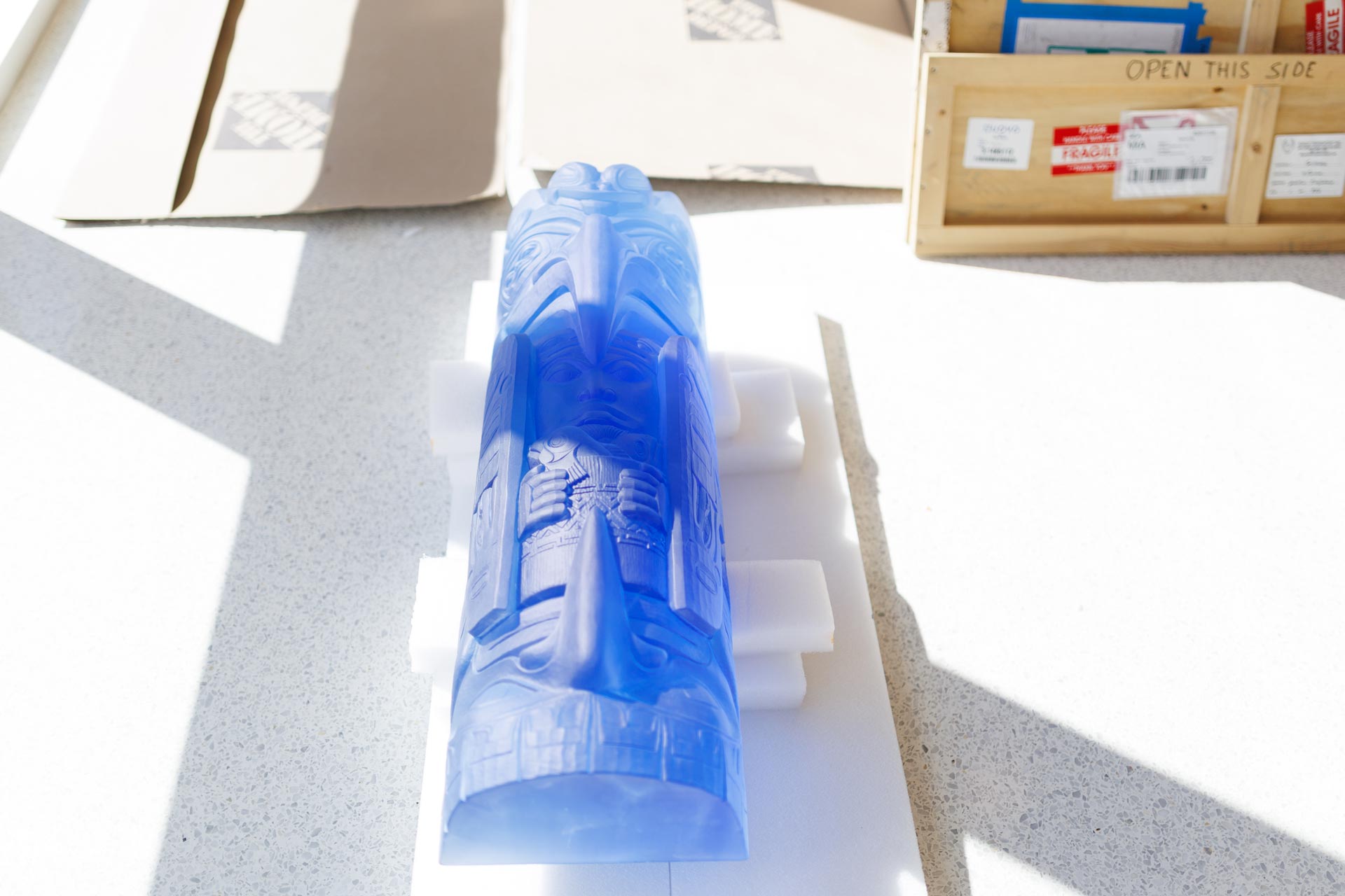 closeup before installation of cast lead crystal sculpture entitled Fog Woman by artist Preston Singletary, photo by Heather Holt